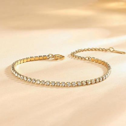 Floral clover gold plated bangle bracelet close up