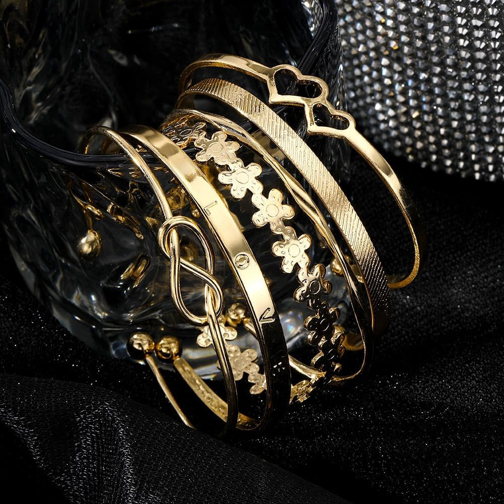 Gold bangle bracelets set displayed showing individual pieces
