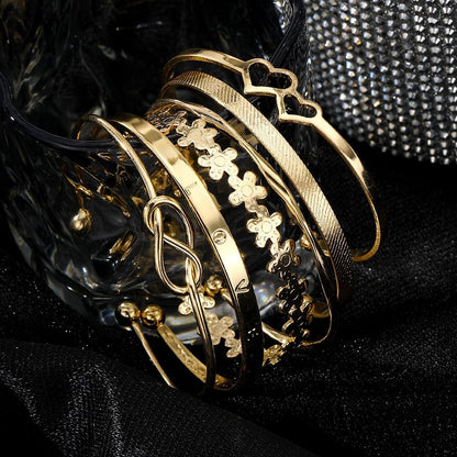 Gold bangle bracelets set displayed showing individual pieces