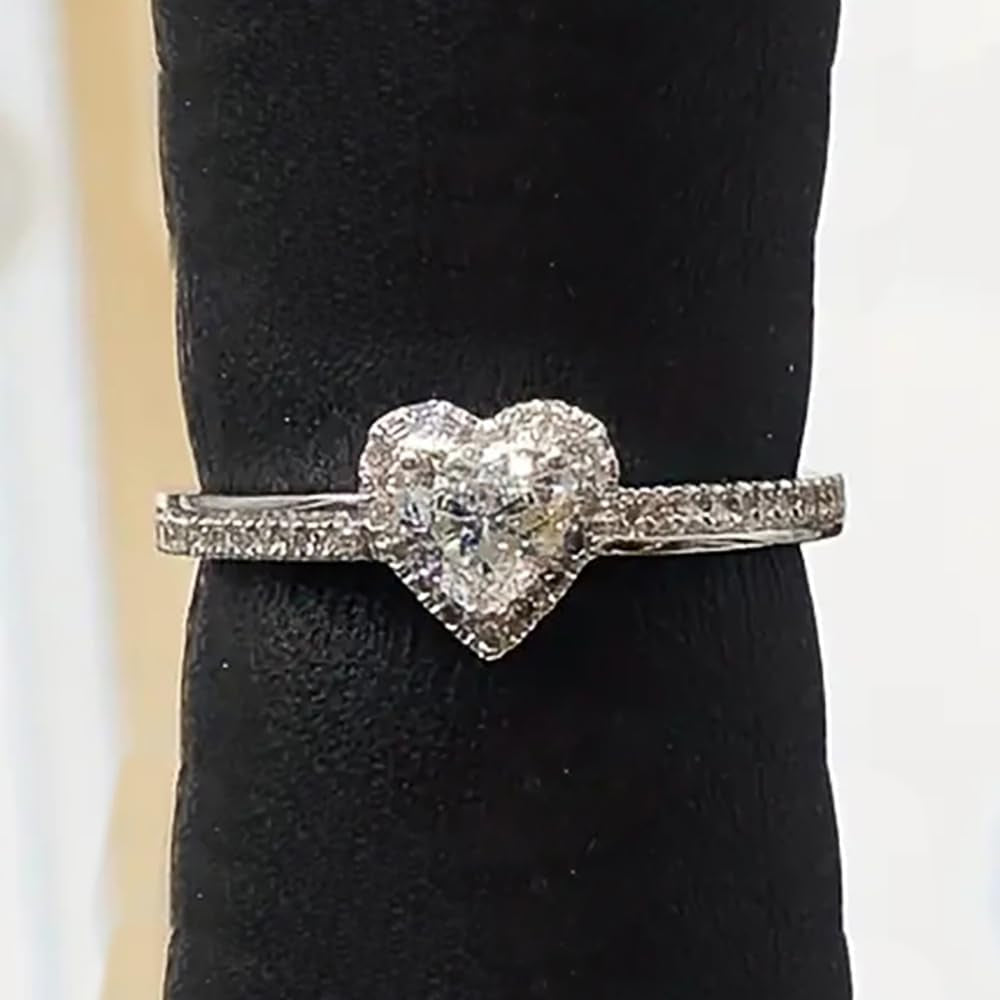 Close-up of heart shaped cubic zirconia stone in wedding band