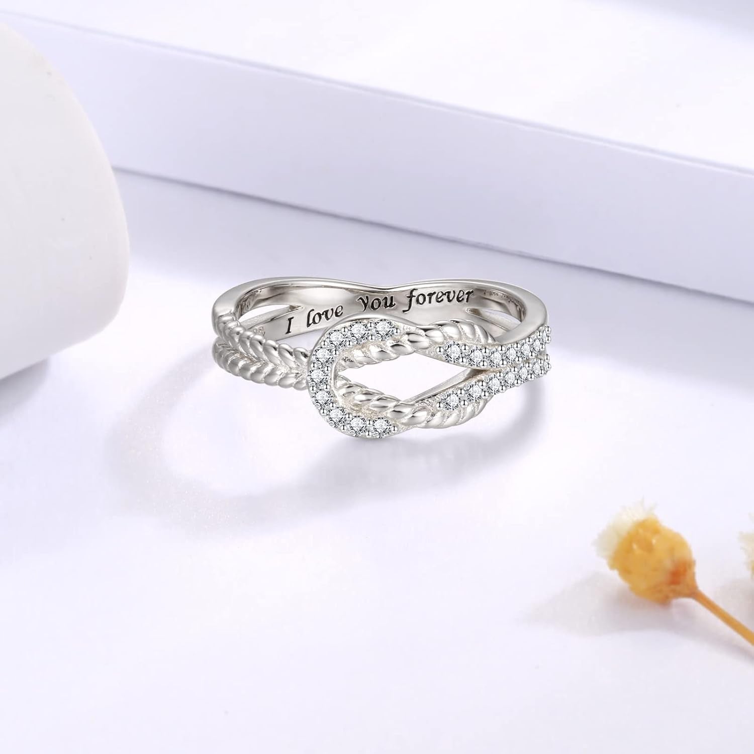 Mother and daughter wearing matching silver rings together