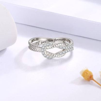 Mother and daughter wearing matching silver rings together