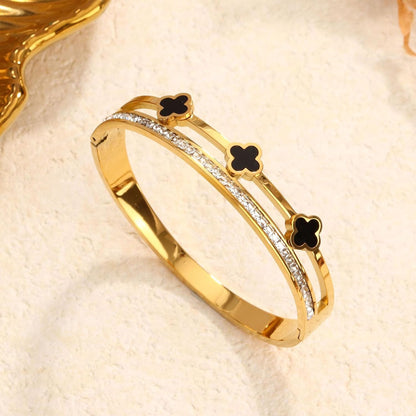 Four leaf clover nail bracelet with sparkling cubic zirconia