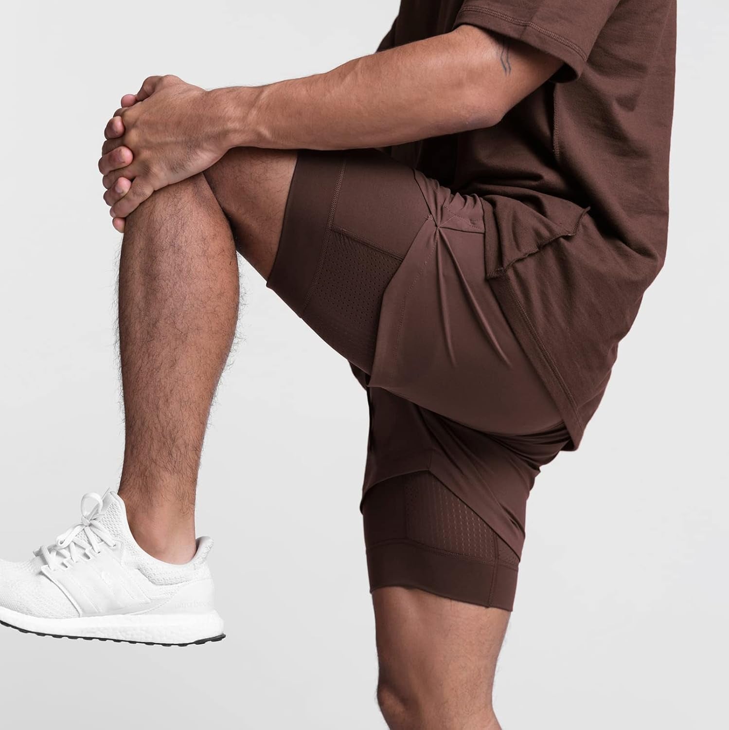Men's 2-in-1 shorts showing inner compression lining