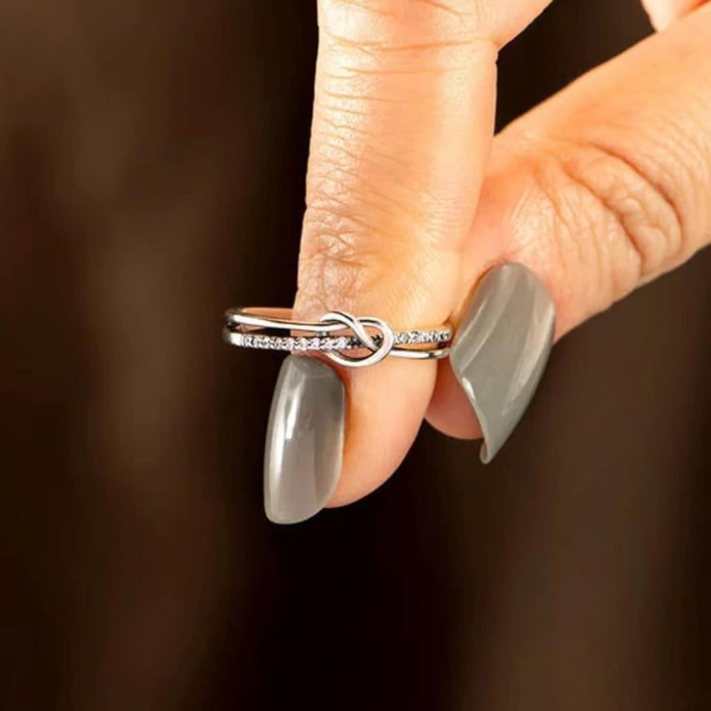 Detailed view of interlocking heart knot pattern