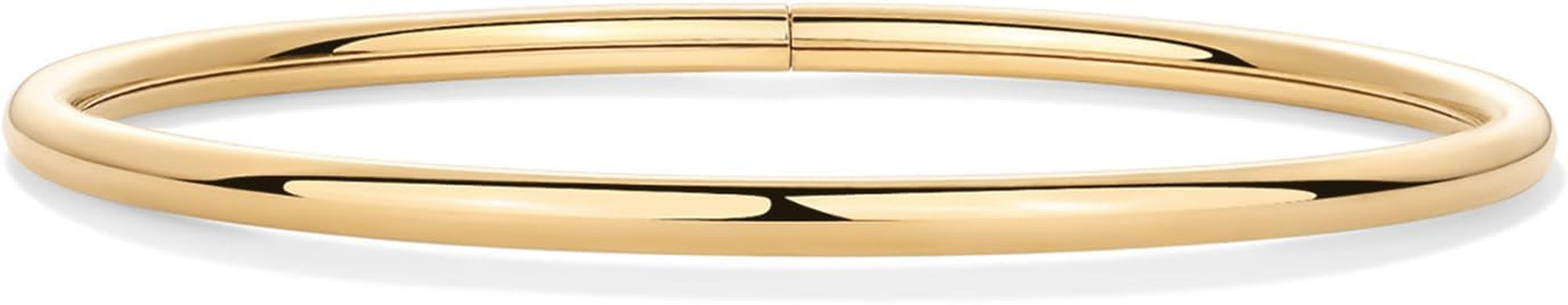 Gold plated stacking bangles worn as pair on wrist