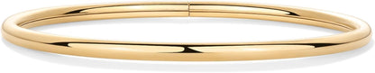 Gold plated stacking bangles worn as pair on wrist