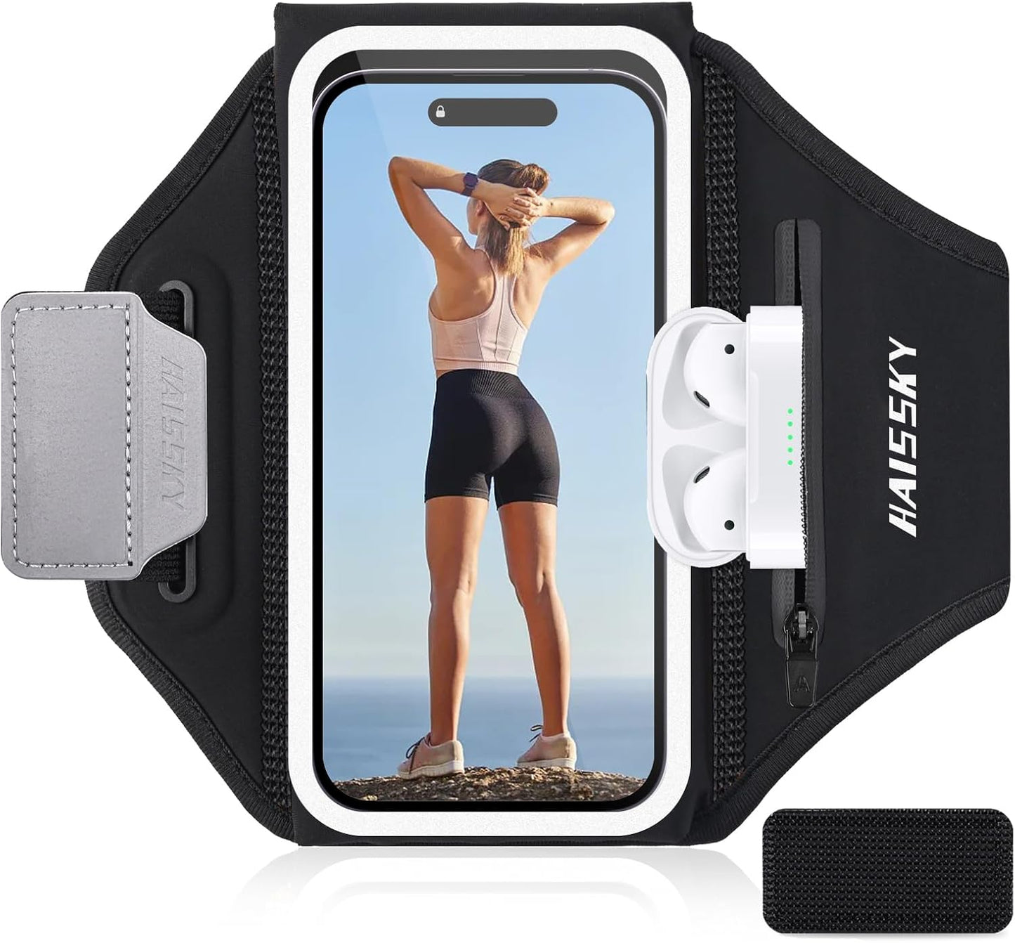 Runner wearing reflective phone armband during outdoor workout