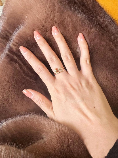 Love ring displayed on both male and female models showing versatility