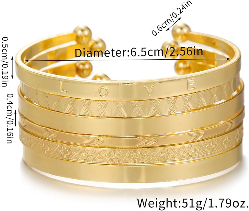 Seven gold cuff bracelets layered styling
