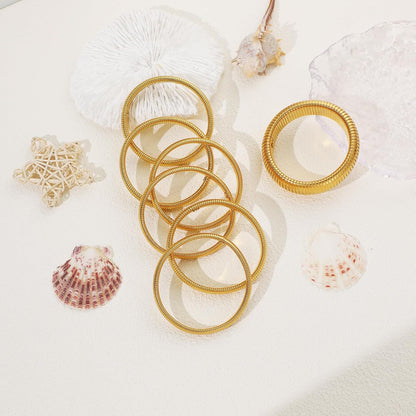 Gold plated bangle bracelet showing thickness and durability