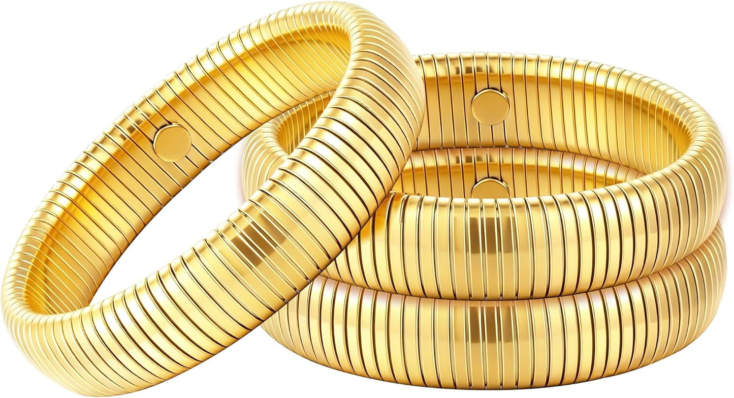 Woman wearing three gold plated stretch bangles stacked