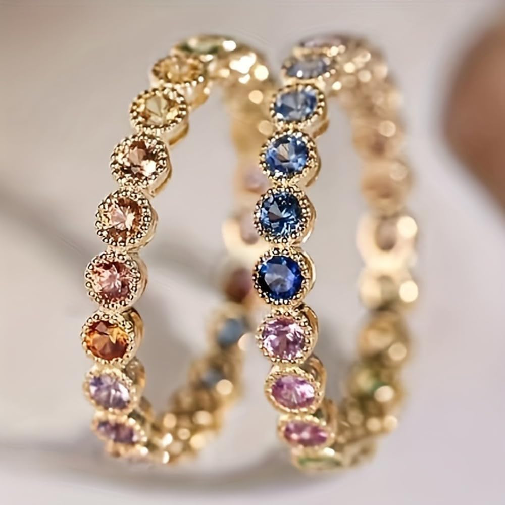 Close-up of sparkling cubic zirconia stones on gold ring
