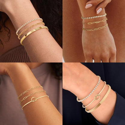 Multiple gold plated bracelets stacked on wrist