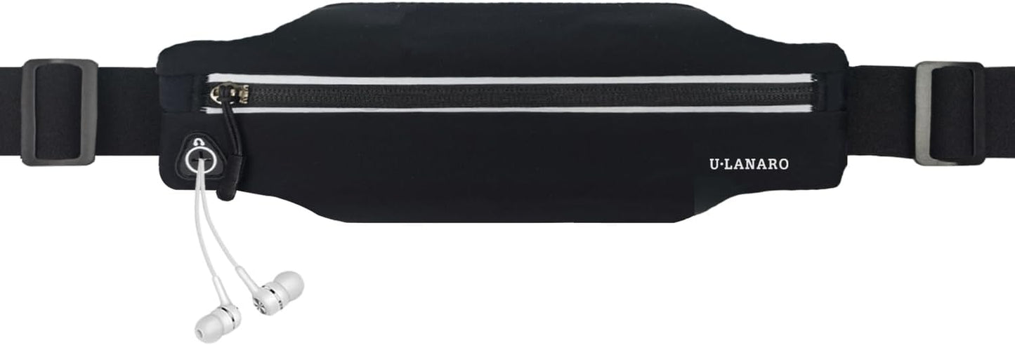 Slim running belt fanny pack worn around waist during jogging