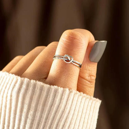 Mother daughter matching heart knot rings together