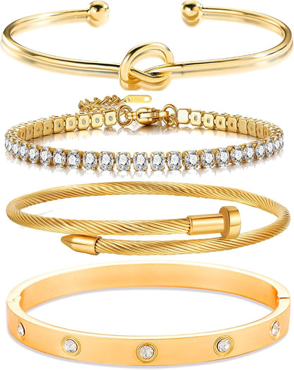 Multiple gold stackable bracelets worn together on wrist