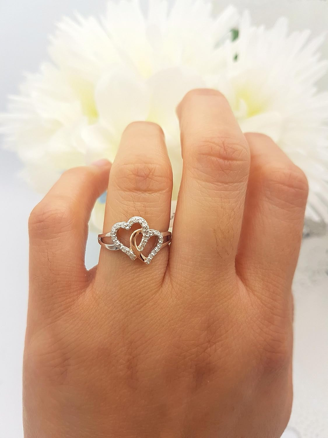 Diamond engagement promise ring with pink gold plating
