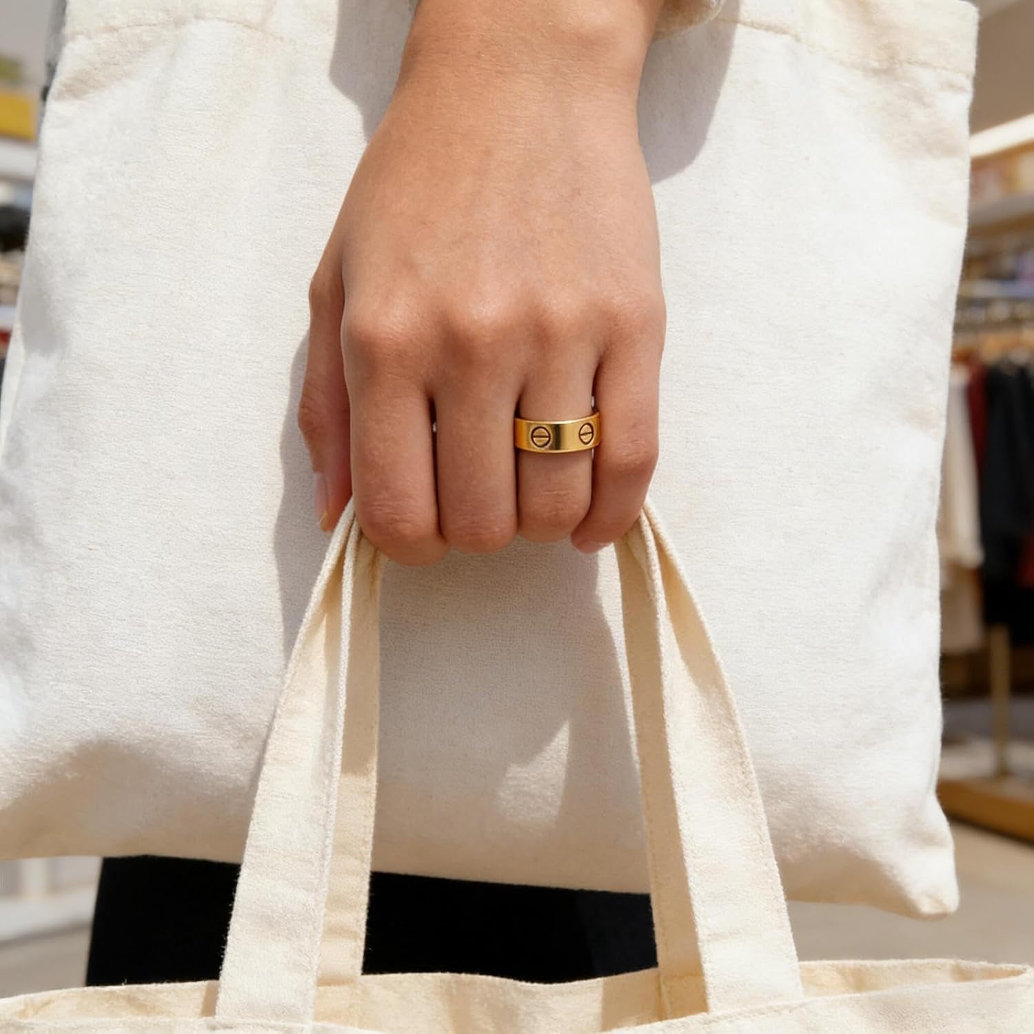 Gold love band ring worn as fashion statement jewelry piece
