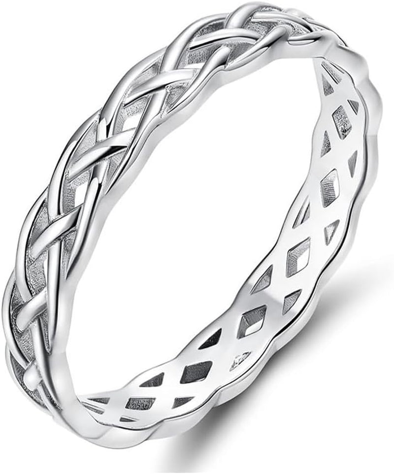 Celtic knot eternity band ring displayed in silver finish