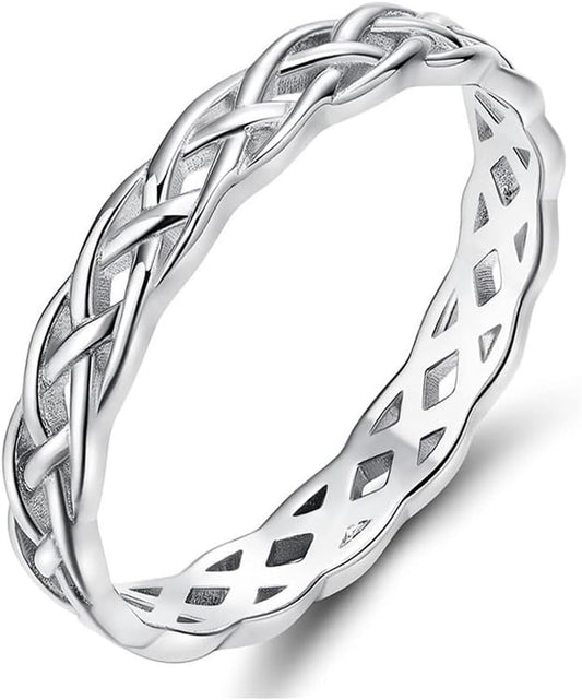 Celtic knot eternity band ring displayed in silver finish