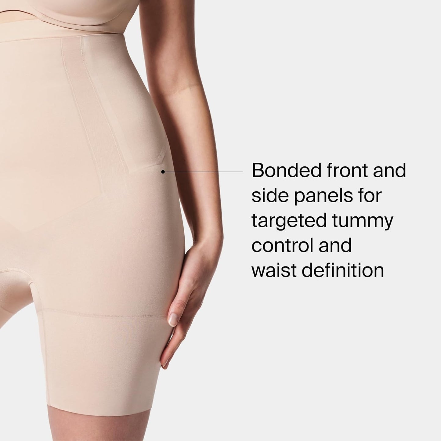 Booty-enhancing shapewear short with pockets from back angle