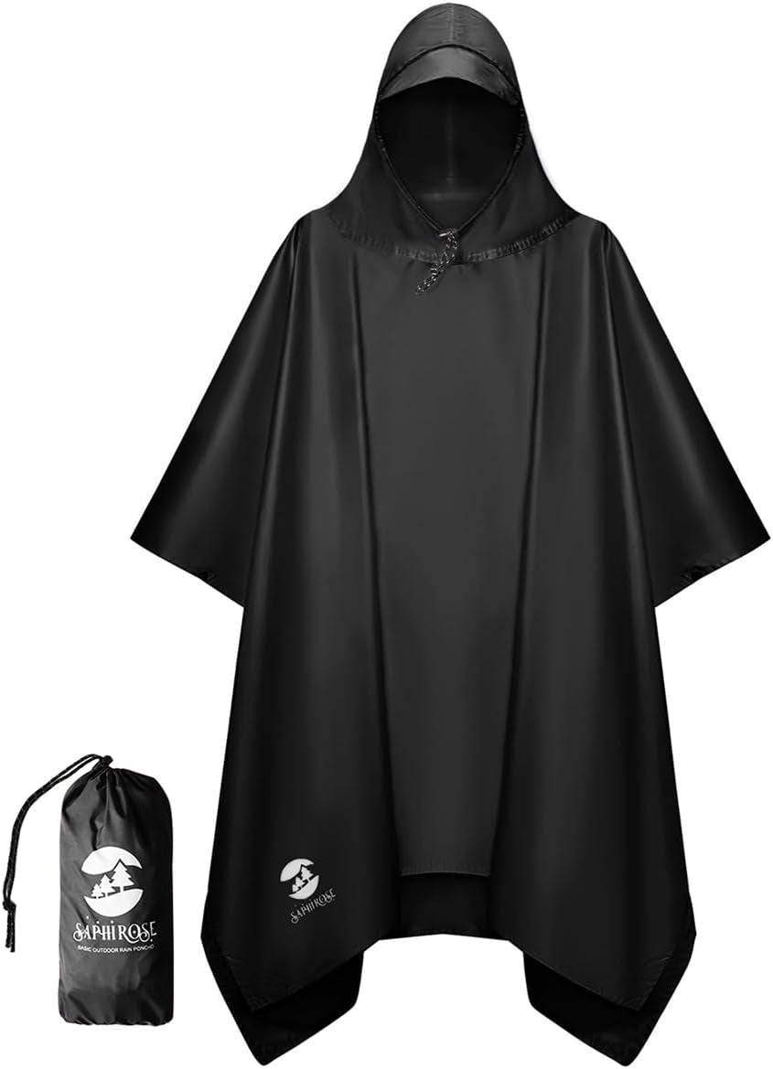 Person wearing Saphirose waterproof hooded rain poncho outdoors