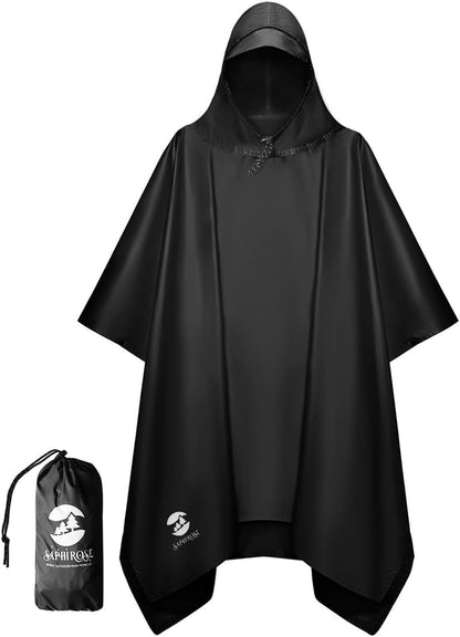 Person wearing Saphirose waterproof hooded rain poncho outdoors