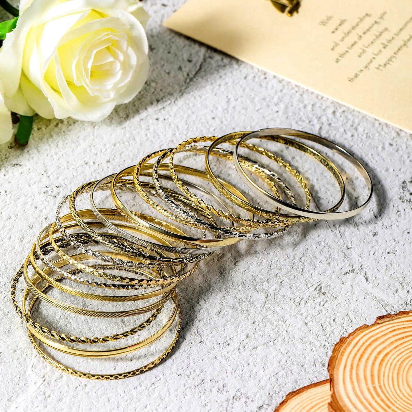Woman modeling vintage Indian stackable bangles on wrist