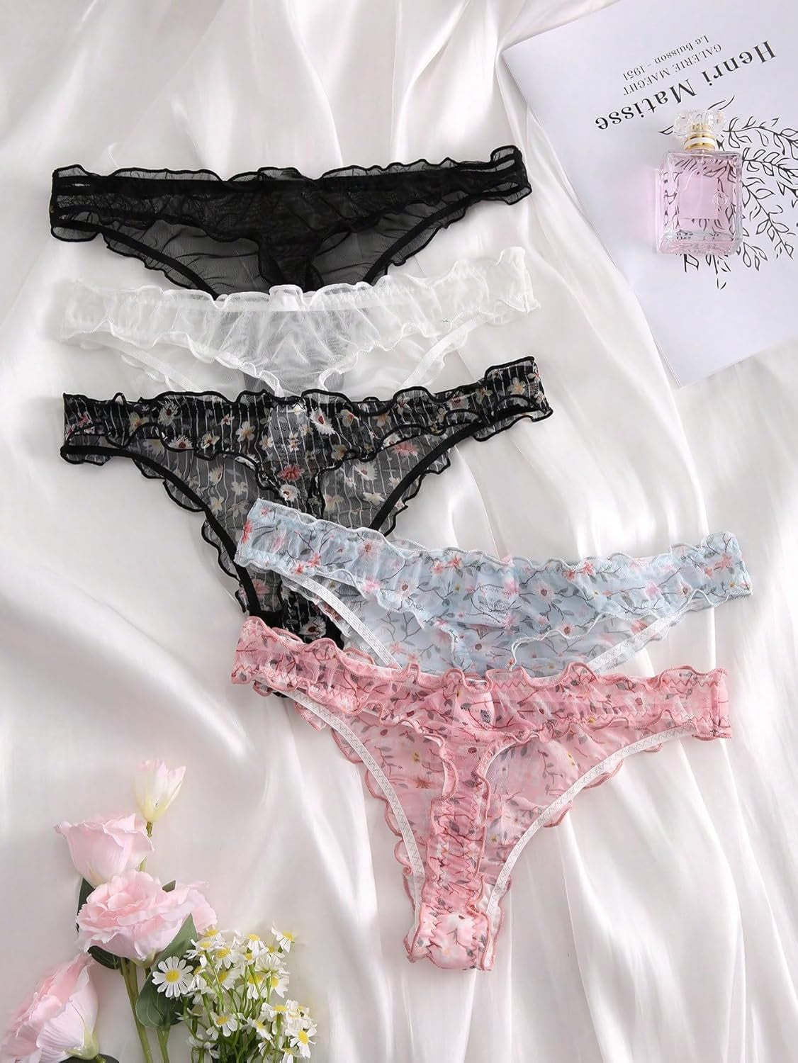 Five pack floral thongs colorful patterns laid flat display