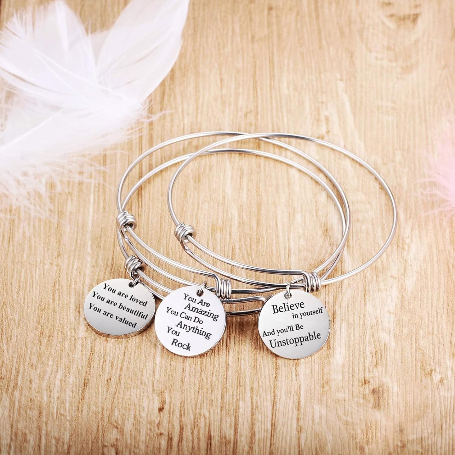 Silver plated expandable bangle bracelet with round charm details