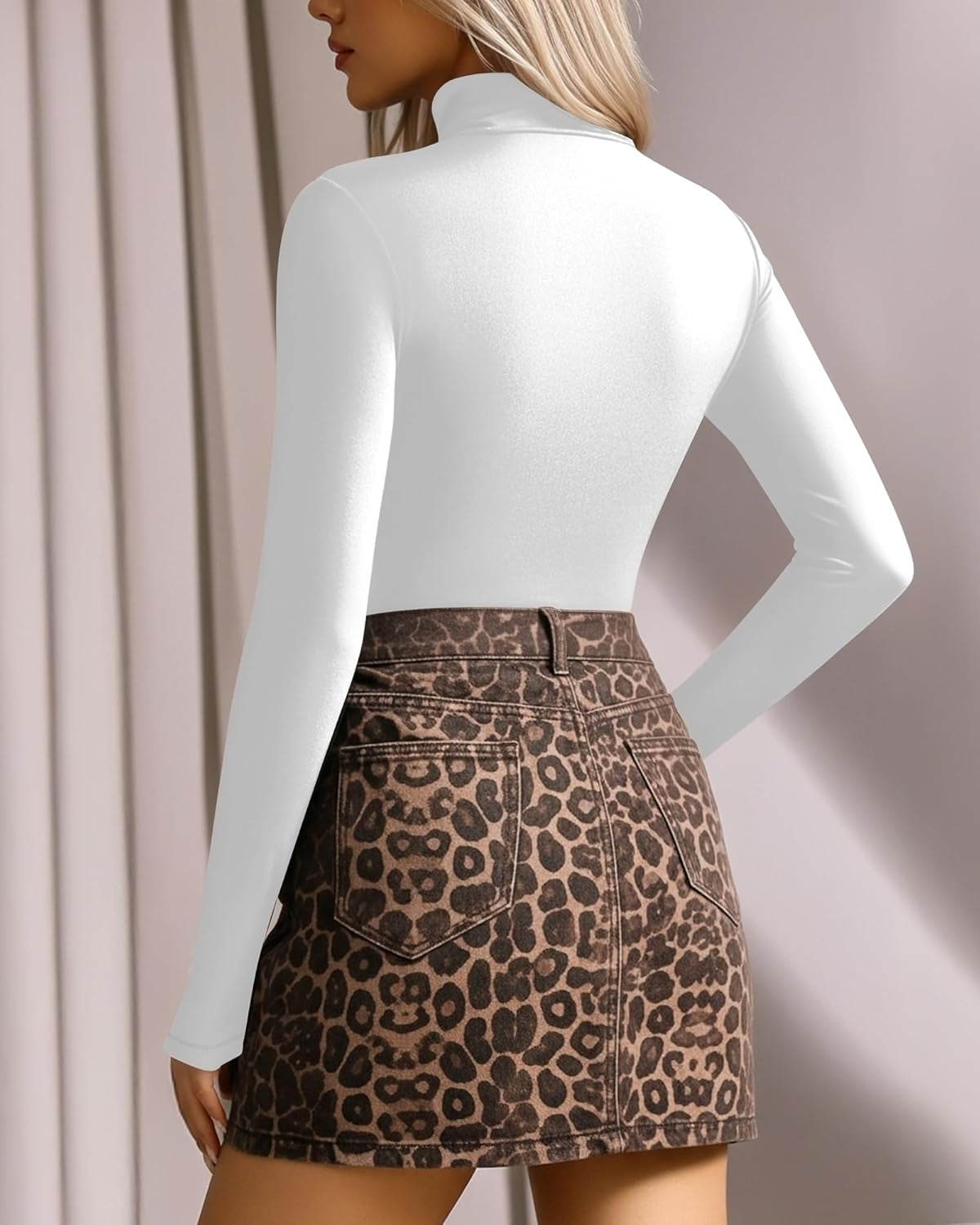 MANGOPOP bodysuit detail showing mock turtle neckline and seaming