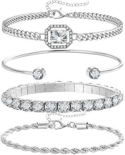 Four-piece gold and silver bracelet set for women displayed together