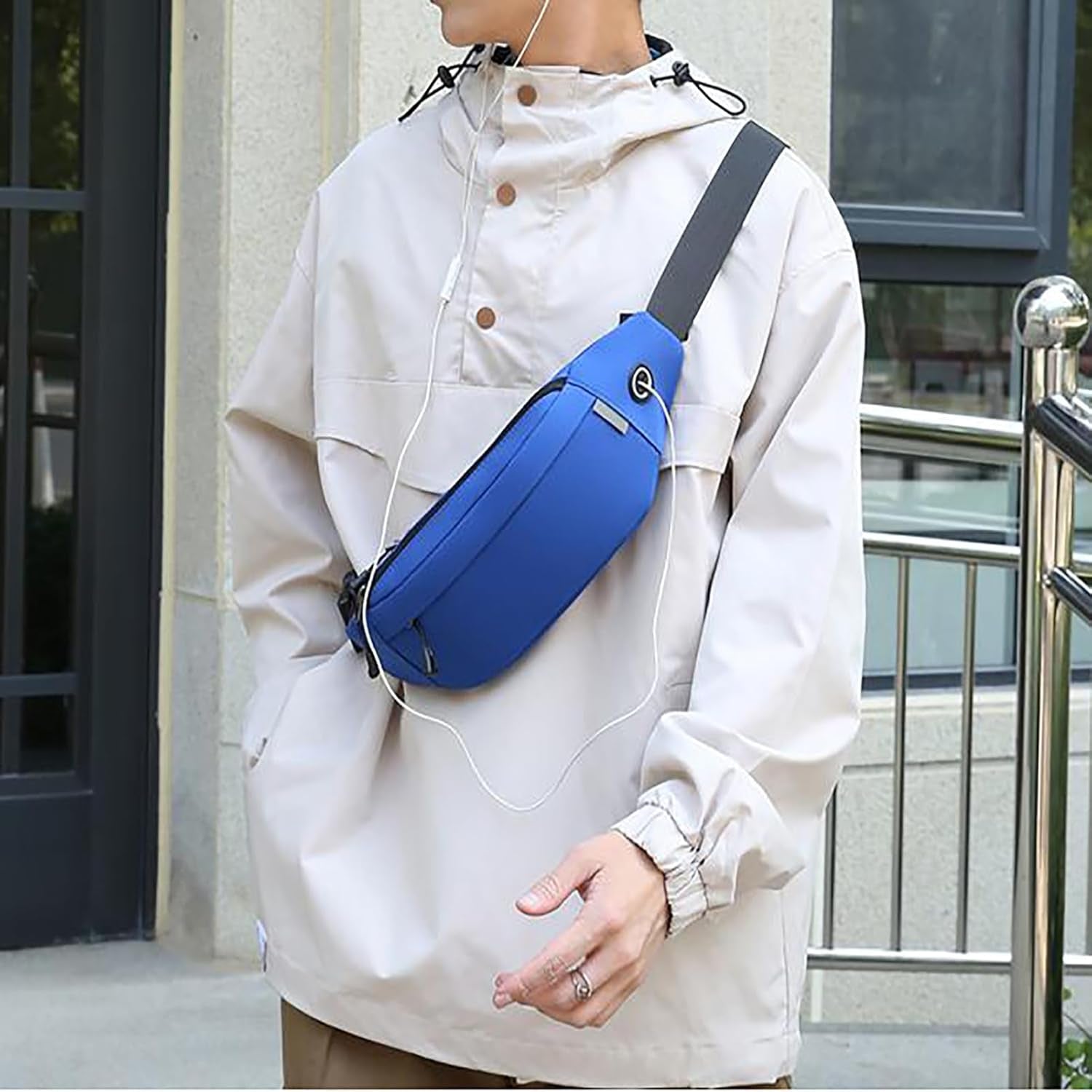Durable black waist bag with carrying handle detail