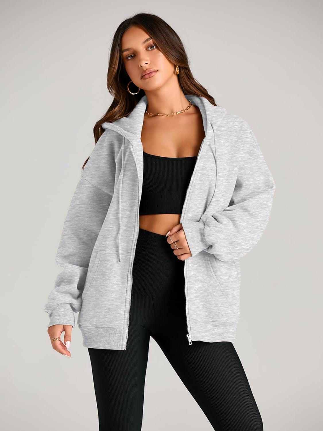 Model wearing EFAN oversized casual sweatshirt with front pockets