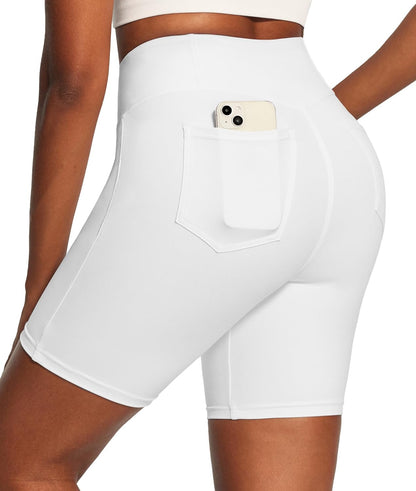 Woman running in IUGA tummy control workout shorts