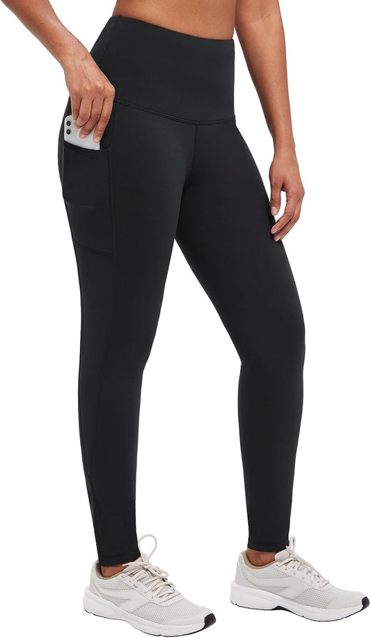 Woman wearing black fleece-lined thermal leggings in winter