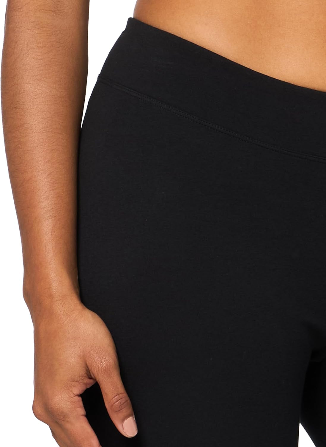 Woman in casual cotton leggings lounging at home with relaxed fit