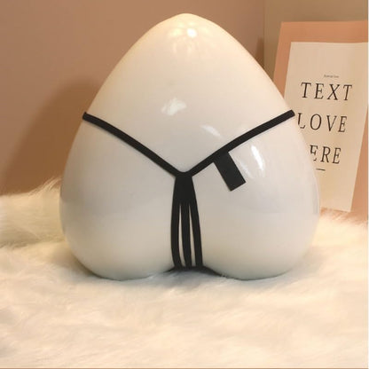 Pearl pendant detail on luxury women's g-string thong panty