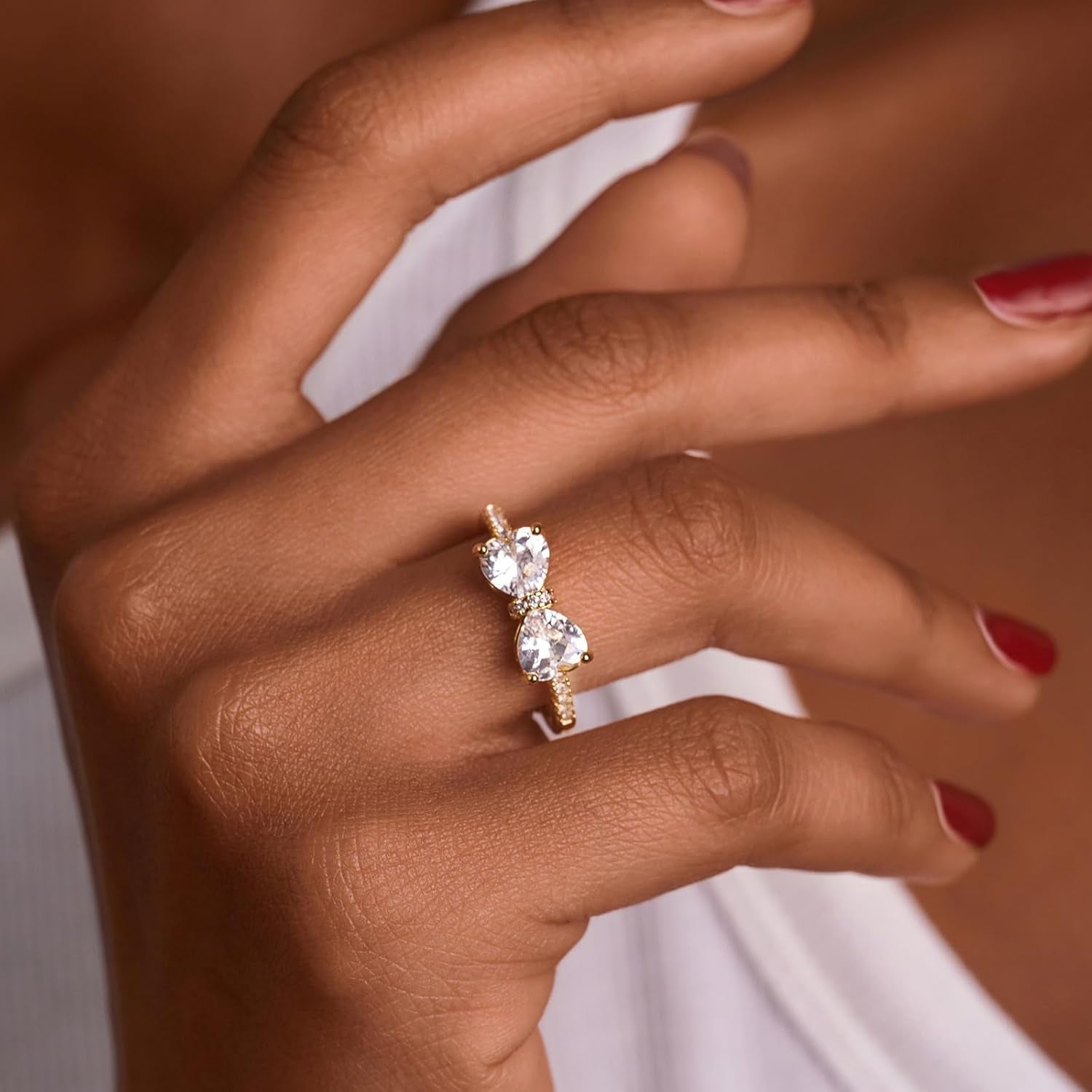 Cubic zirconia eternity bow ring in elegant silver finish
