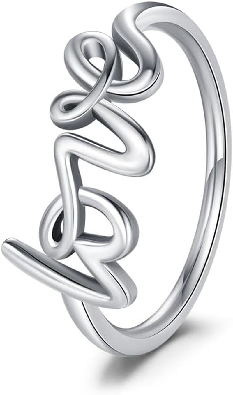 Delicate band of hearts ring in polished sterling silver