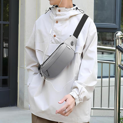 Large crossbody bag being packed with valuables