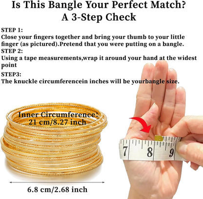 Multiple boho gold bangles stacked on wrist together