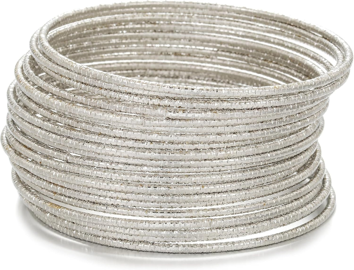 Chunky textured metal gold bangle bracelets detail view