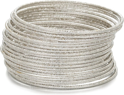 Chunky textured metal gold bangle bracelets detail view