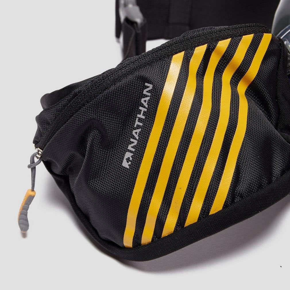 Close-up of zippered storage pocket on Nathan Swift Plus hydration running belt