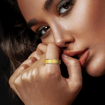 Dainty gold love ring with rotating center band for adults