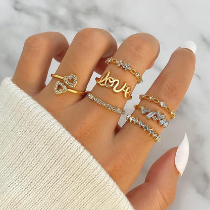 Close-up of gold moon and star details on stackable rings