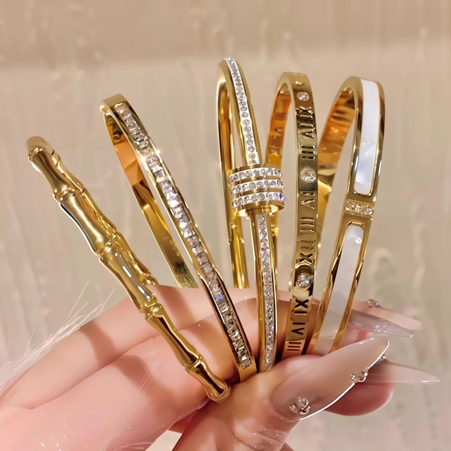 Silver stainless steel bangle bracelets in stackable five-piece set