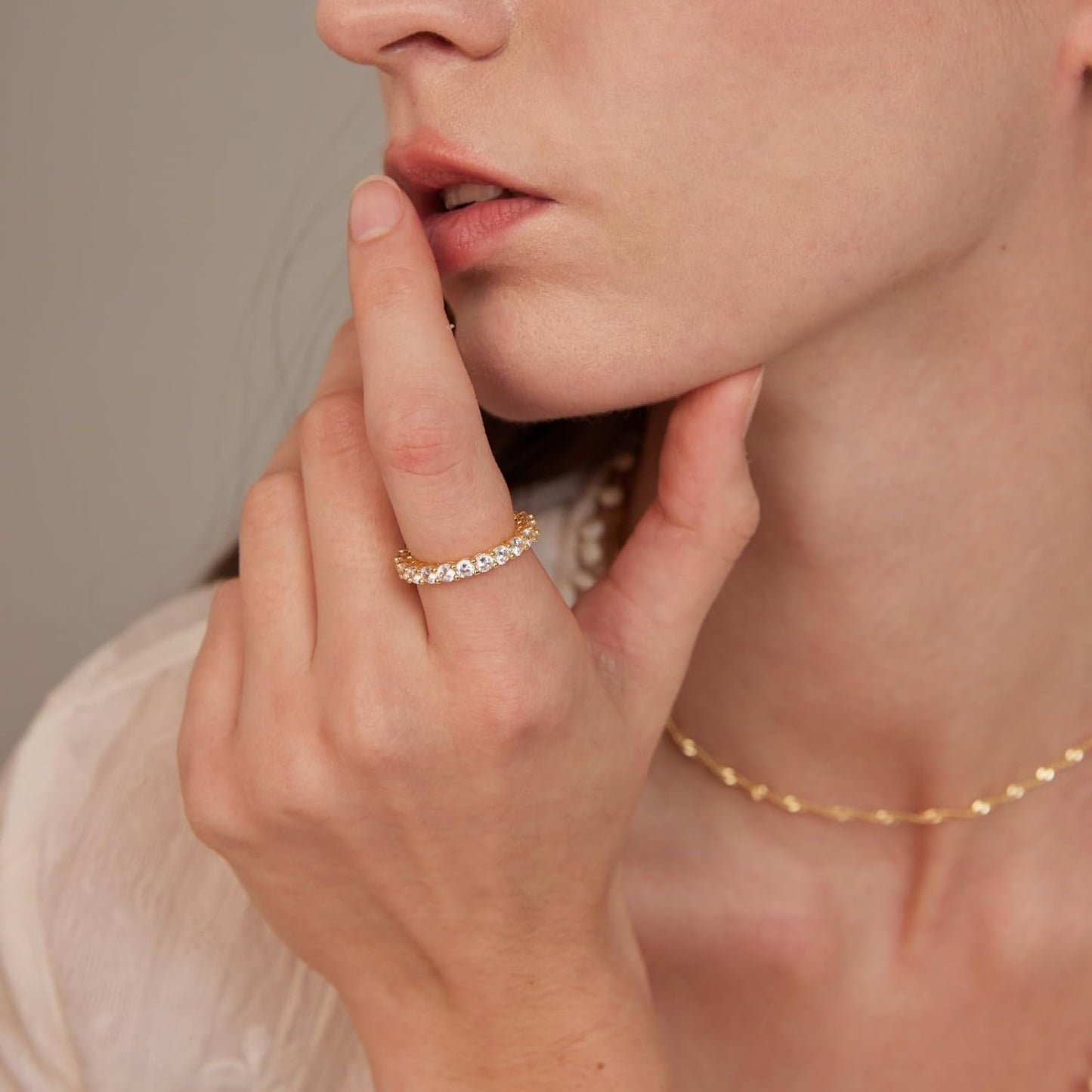14K gold plated cubic zirconia stackable rings on hand
